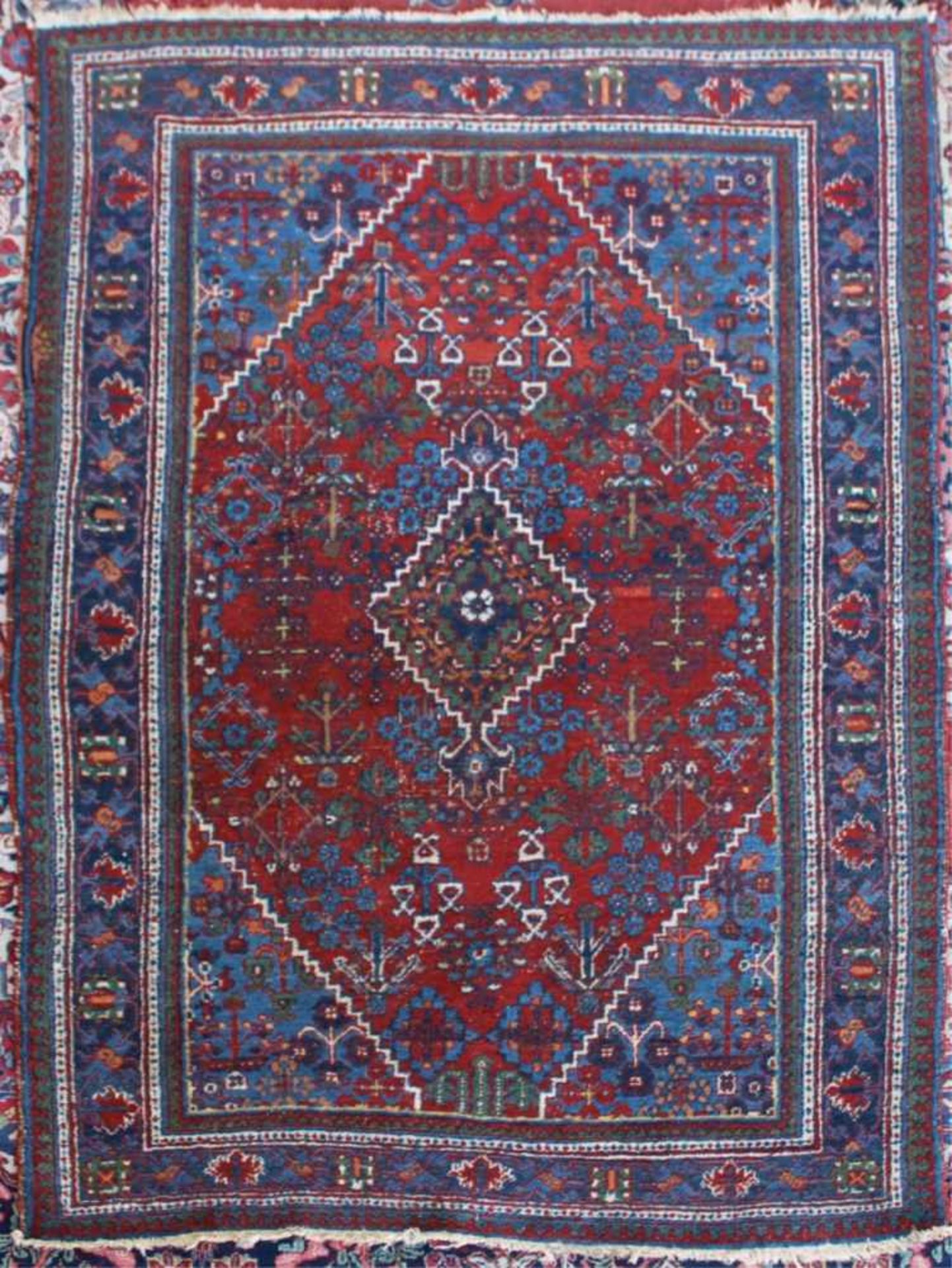 Antiker OrientteppichRot und blaugrundig, ca. 205 cm x 129 cm