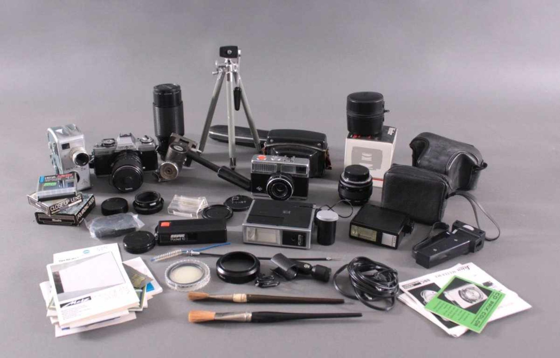 Konvolut Fotoaparate und Zubehör1 Minolta Kamera XG-M mit RMC Tokina Objektiv 35-70 mm 1: