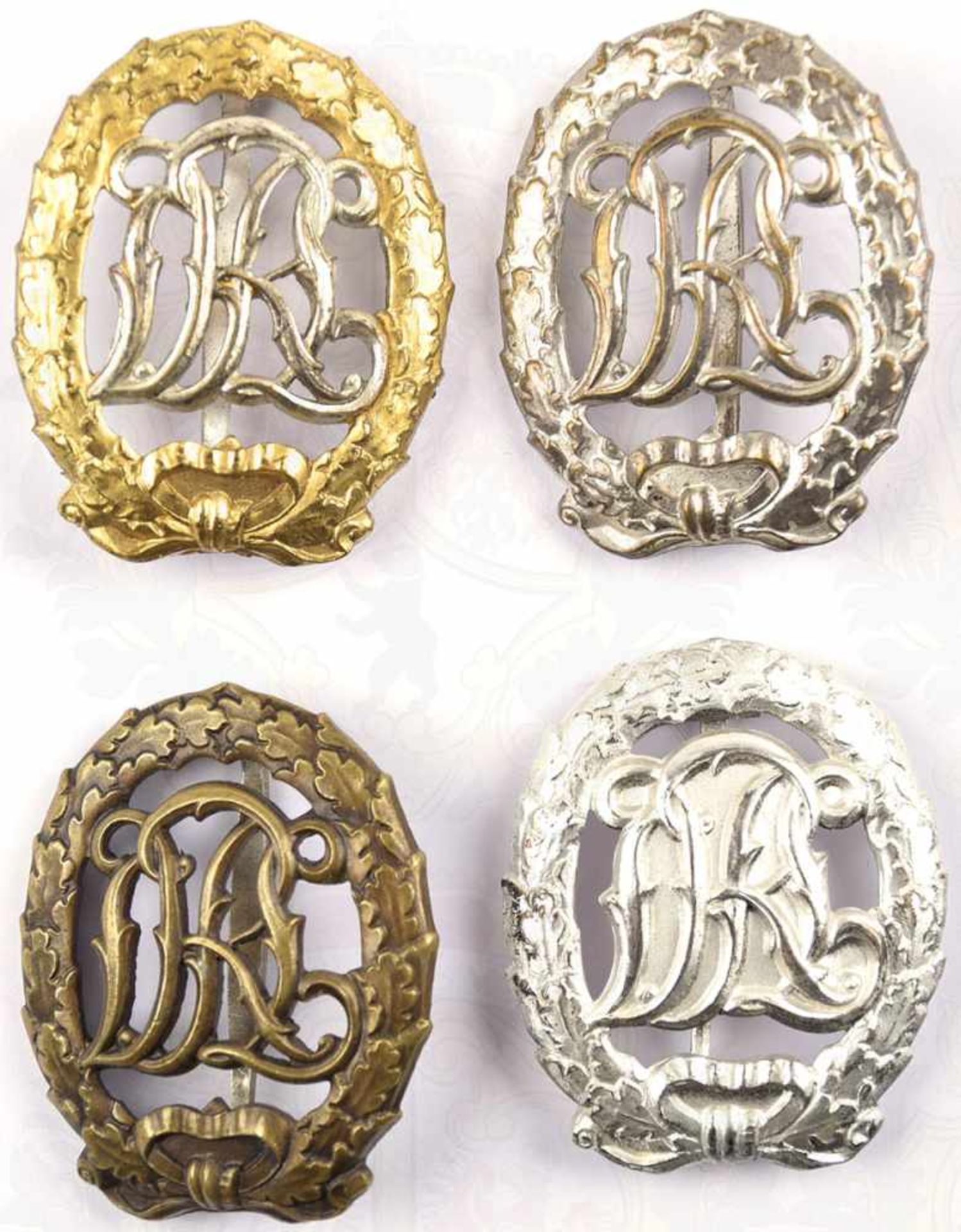 SATZ TURN- UND SPORTABZEICHEN in Gold, Silber u. Bronze, Buntmetall, entspr. beschichtet, leicht