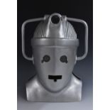 Doctor Who - an old style Cyberman head piece, constructed of silver painted fibreglass,