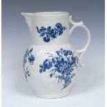 A Worcester Bouquets pattern Cabbage Leaf Mask jug, moulded with overlapping leaves,