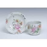 A Worcester petal lobed finger bowl and stand, of typical form, painted in the Meissen manner,