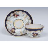 A Worcester ribbed tea bowl and saucer,