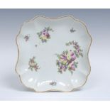 A Worcester lobed square dessert dish, painted in the atelier of James Giles,