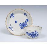 A Worcester Warmestry fluted shape tea bowl and saucer, painted in Dry Blue,
