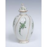 A Worcester ovoid tea canister and cover, decorated in the manner of Giles,