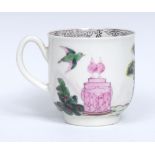 A Worcester Valentine pattern coffee cup, painted with two doves perched on a quiver of arrows,