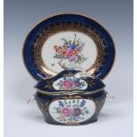 A Worcester quatrelobed oval tureen, cover and stand, shell handles,