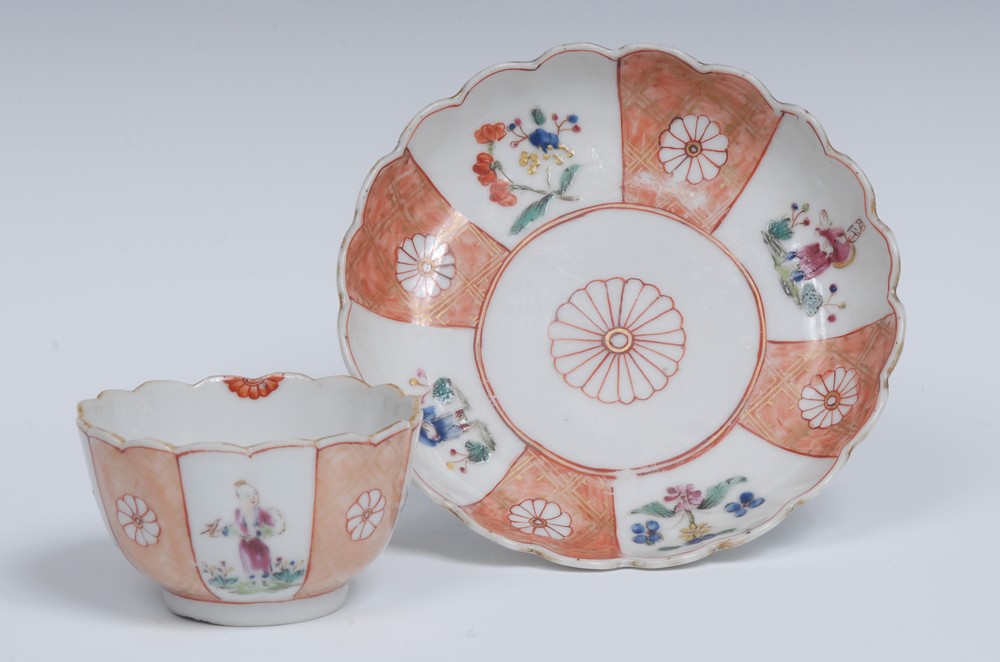 A Worcester type Scarlet Japan pattern tea bowl and saucer, possibly painted by James Giles,