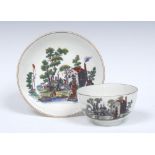 A Worcester tea bowl and saucer, printed after Robert Hancock,