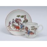 A Worcester Red Bull pattern coffee cup and saucer, coloured and outlined in black with bull,