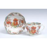 A Worcester Jabberwocky pattern ogee chocolate cup and saucer, shaped rims,