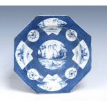 A Worcester powder blue octagonal plate, painted with a river scene landscape to the centre,