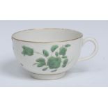 A Worcester teacup, decorated in the manner of James Giles, in two shades of green with roses,