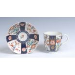 A Worcester Rich Queen's pattern coffee cup and associated saucer, grooved handle,