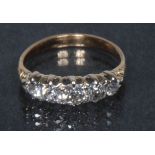 A graduated diamond five stone line ring, total estimated diamond weight approx 1.