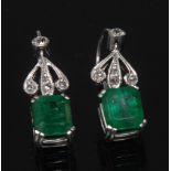 A pair of emerald and diamond Art Deco style earrings, each with a rectangular cushion cut emerald,