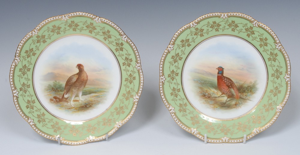 A pair of Aynsley circular shaped circular plates, painted by F.