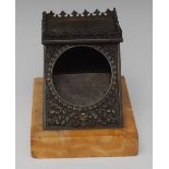 A post-Regency dark patinated bronze pocket watch stand, hinged cover with shaped gallery,