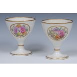 A pair of Mansfield decorated goblets, painted with oval cartouches with colourful summer flowers,