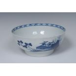 A Worcester Precipice pattern punch bowl, painted in underglaze blue with huts, trees and foliage,