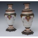 A pair of early 20th century gilt metal mounted and continental porcelain castlettes,