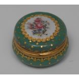 A late 19th century French circular green enamel bonbonnière, in the 18th century manner,