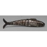 A 19th century Continental novelty silver reticulated lady's sewing etui, as a fish,