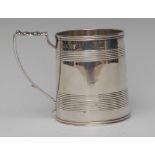 A George III silver slightly spreading cylindrical mug, moulded rim above two reeded bands,