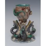 A late 19th century Portuguese majolica goblet vase, encrusted with shells, lizards and insects,