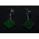 A pair of emeralds and diamond earrings,