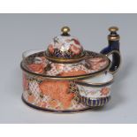 A Royal Crown Derby Imari inkwell, of cylindrical form, with central well, five pen apertures,