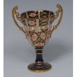 A Royal Crown Derby 6299 pattern miniature/toy two handled pedestal trophy vase, 10.