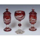 A late 19th century Bohemian ruby flashed goblet, etched with stag amongst foliage,