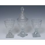 A harlequin Regency cut glass sweetmeat garniture, possibly Irish,