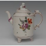 A Ludwigsburg cylindrical teapot and cover, lion finial, painted with colourful summer flowers,