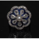 A diamond sapphire and pearl cluster ring, central pearl,