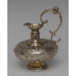 A Continental silver-gilt and stone set compressed globular miniature ewer,