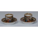 A pair of 19th century Vienna coffee cans and saucers, decorated with Sabinerin and Calista,