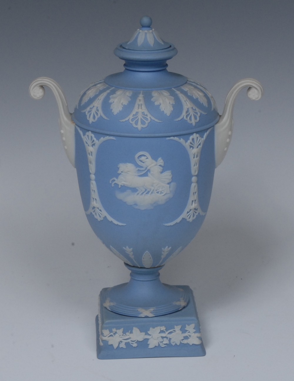 A Wedgwood Jasperware two handled pedestal ovoid vase and cover,