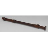 An early 19th century three-piece rosewood tenor recorder,