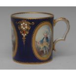 A Sevres style coffee can/mug, painted with three tooled gilt panels of children acting as adults,