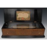 A large 19th century Swiss walnut and ebonised rectangular music box,