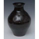 Geoffrey Whiting (British, 1919 -1988), a stoneware vase, with ich tenmoku glaze, incised in lines,