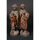 A large pair of early 20th century Austrian terracotta figures, of Nubian Water Carriers,