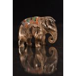 A carved rock crystal enamel and metal elephant,