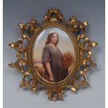 A 19th century Berlin oval plaque, Ruth in the Cornfield, gilt foliate carved frame, 21cm high, c.