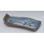 Jim Robinson (British Cotemporary), a stoneware free form dish, in mottled blue, 31cm wide,