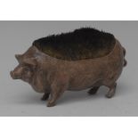 An early 20th century Austrian novelty cold-painted bronze pen wipe, as a pig, standing four square,