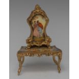 A Continental enamel and gilt metal musical miniature model, of a Louis XV bonheur du jour,